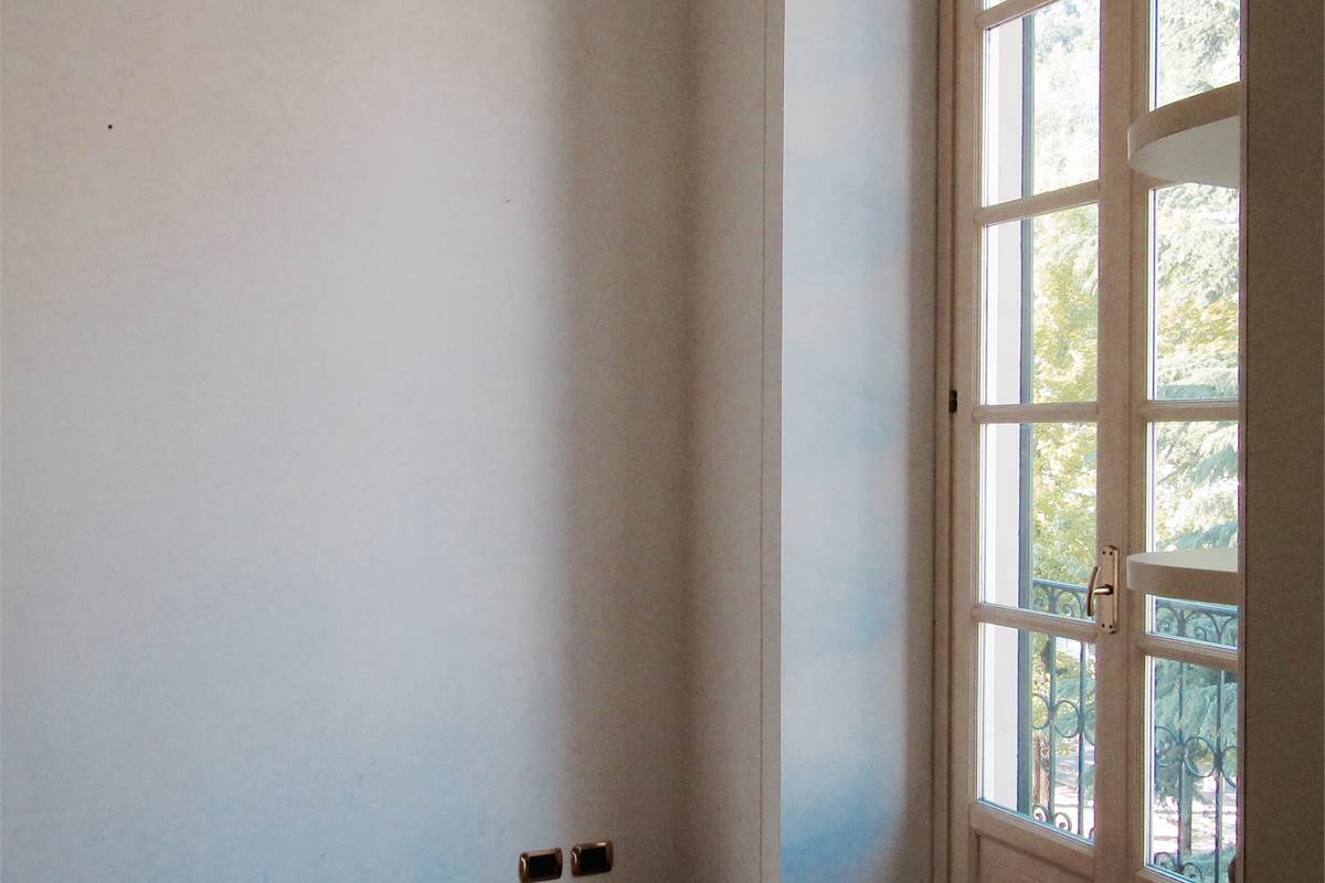 Elegante appartamento con terrazzo, camino, box doppio e posto auto
