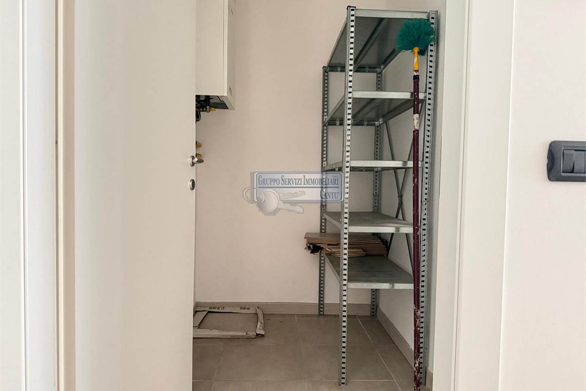 Bilocale moderno, completamente arredato, con box auto