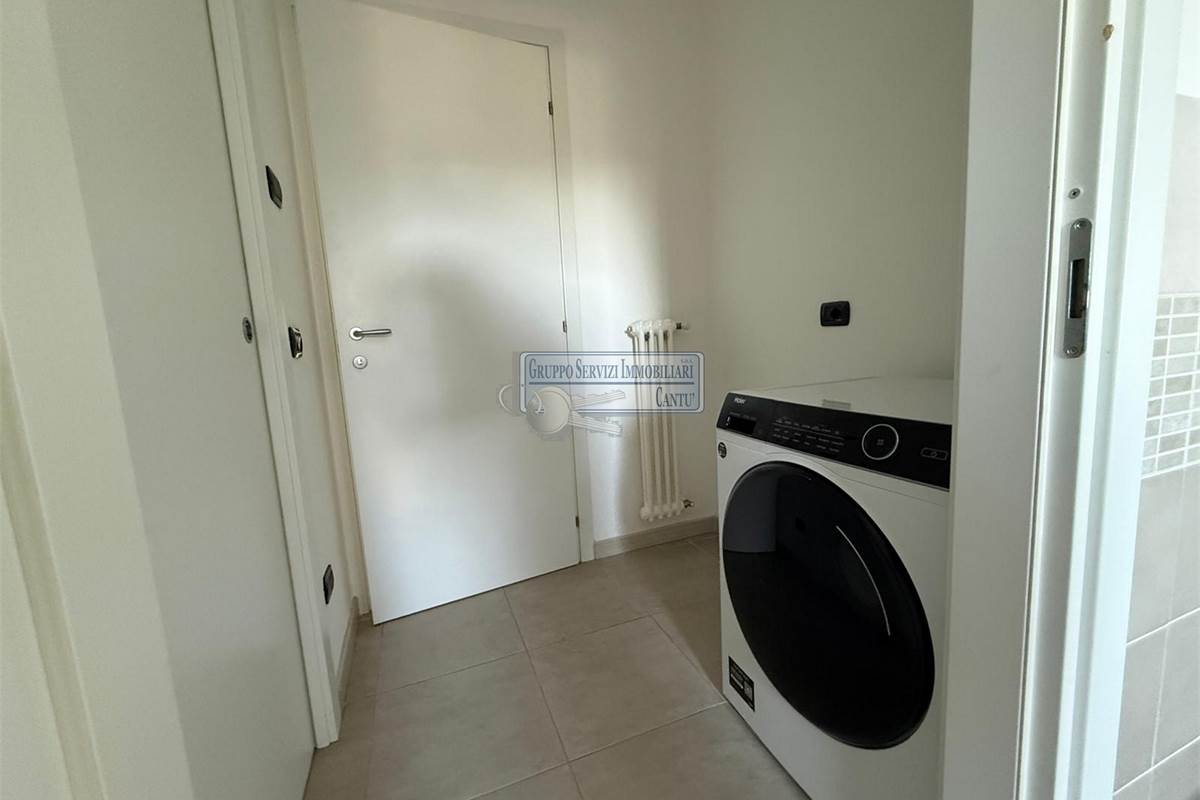 Bilocale moderno, completamente arredato, con box auto