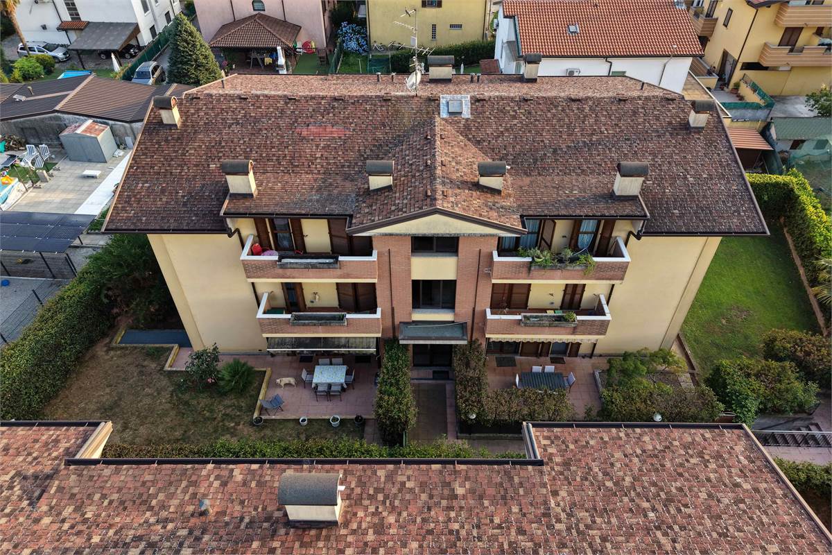 Trilocale al PT con giardino taverna e box