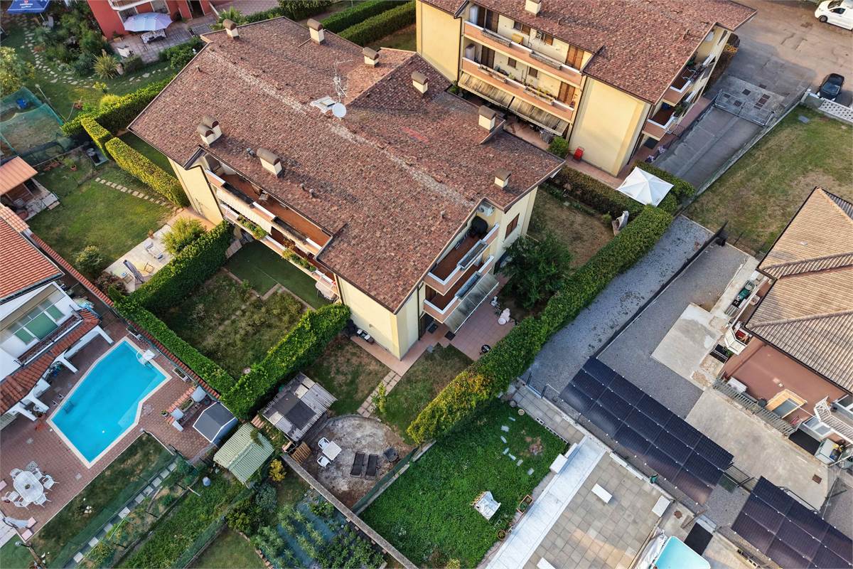 Trilocale al PT con giardino taverna e box
