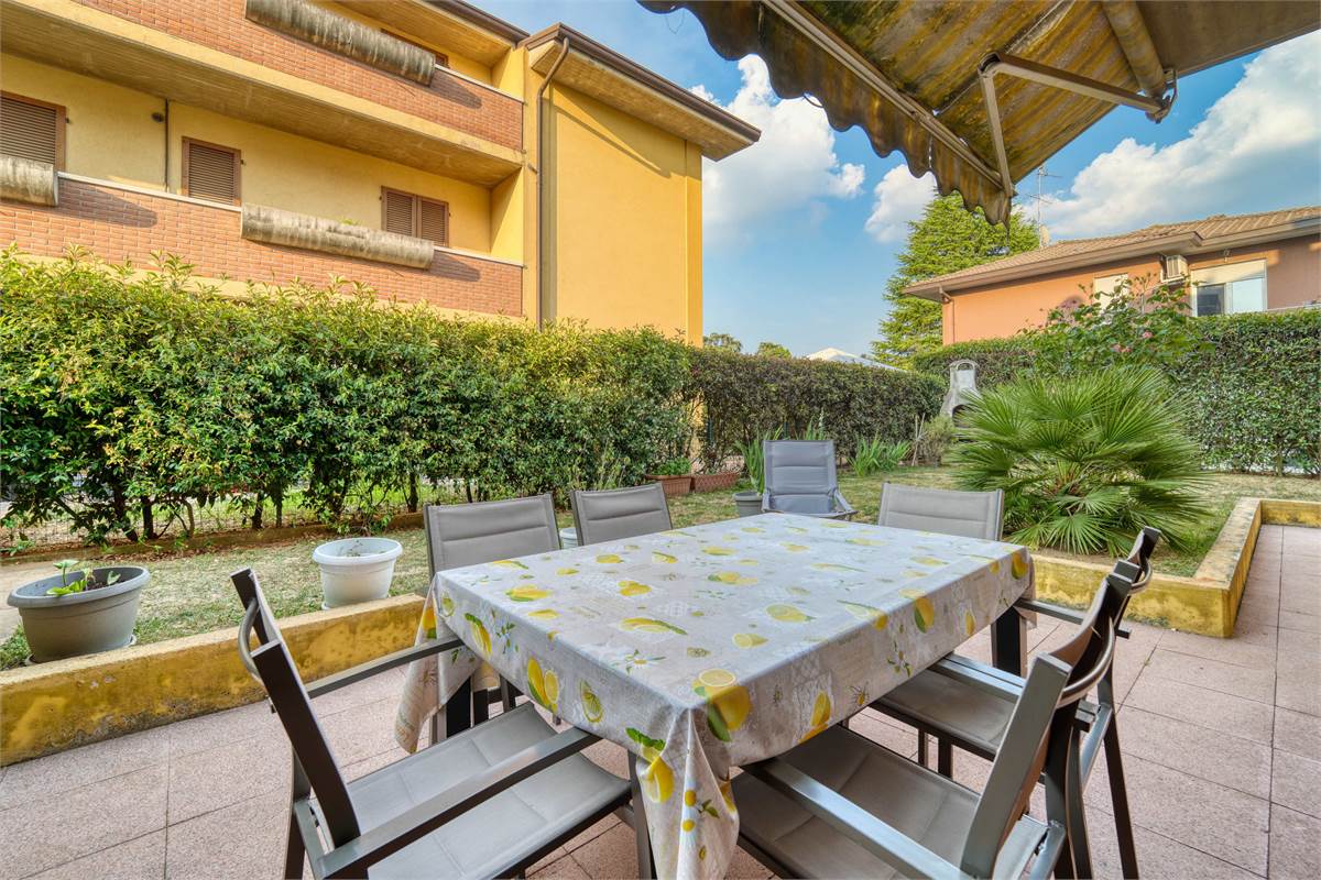 Trilocale al PT con giardino taverna e box