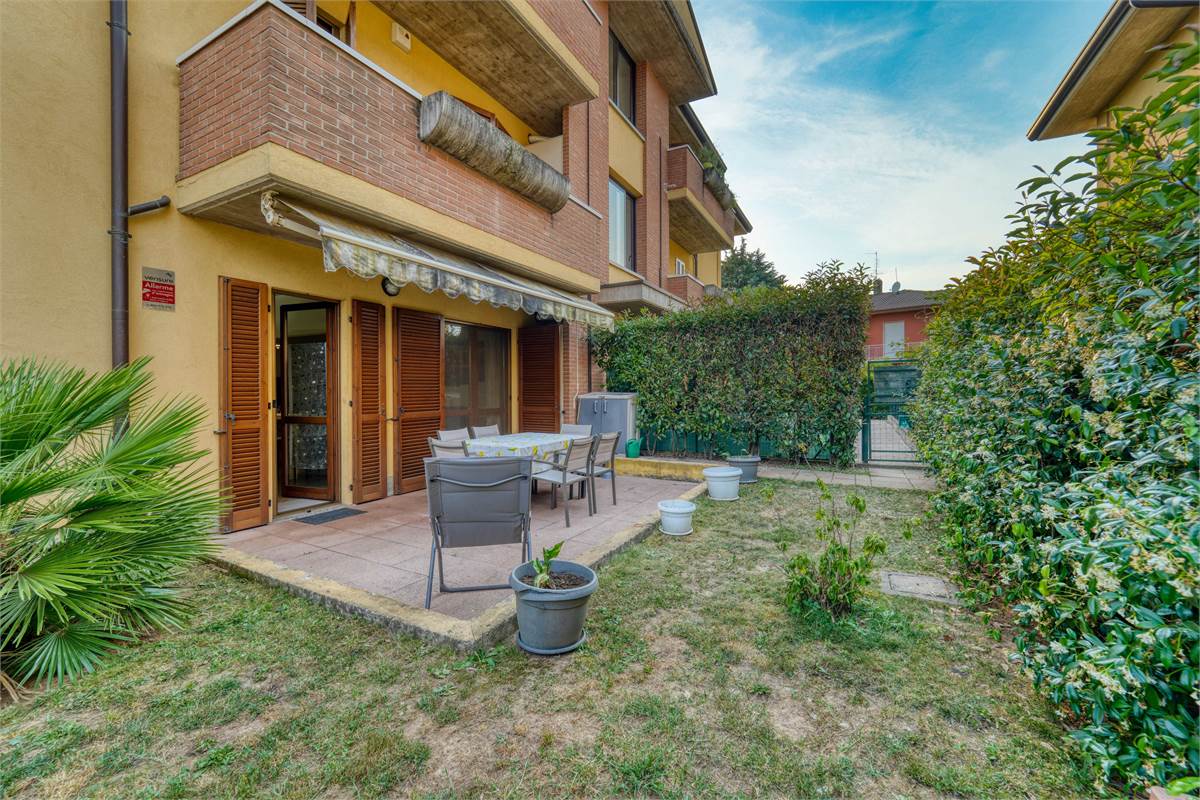 Trilocale al PT con giardino taverna e box