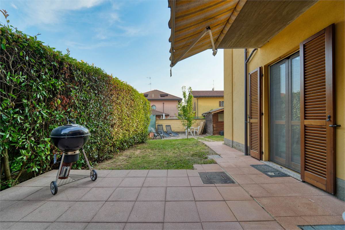Trilocale al PT con giardino taverna e box