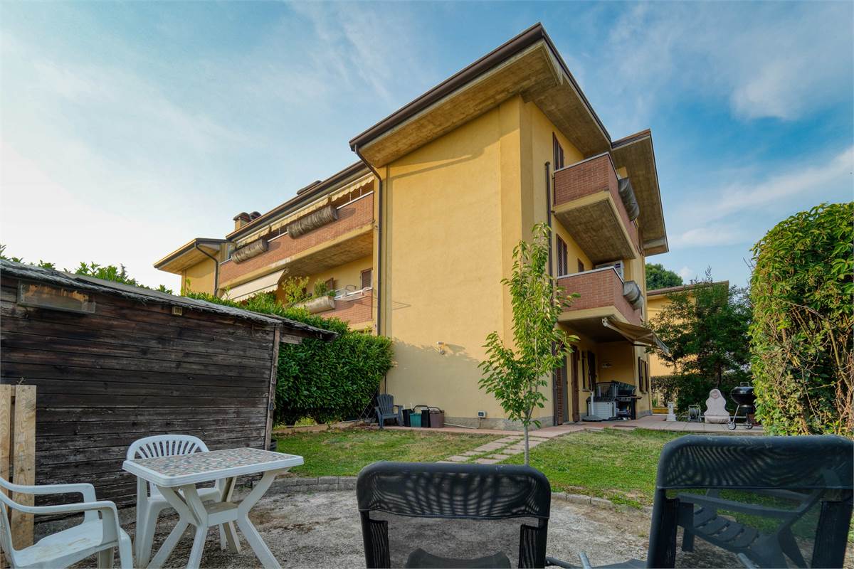 Trilocale al PT con giardino taverna e box
