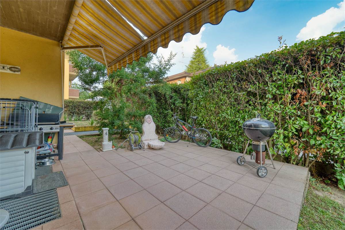 Trilocale al PT con giardino taverna e box
