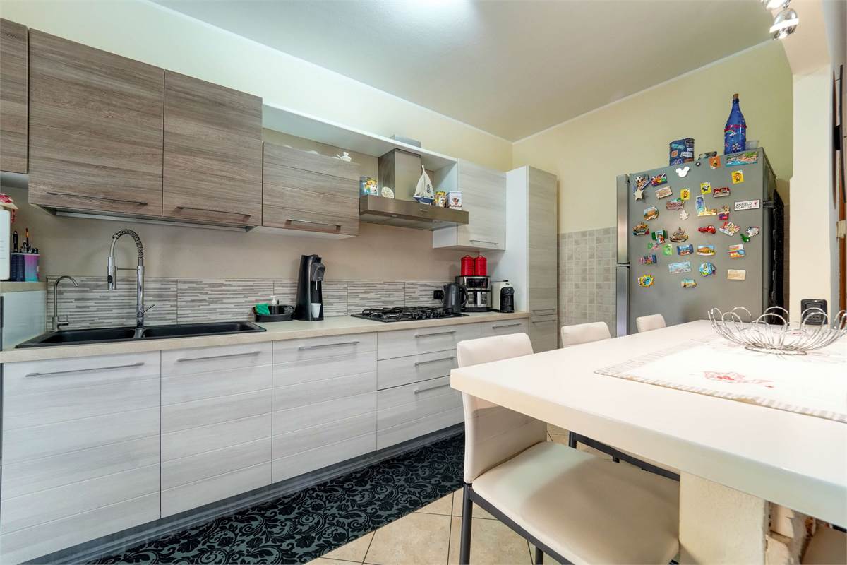 Trilocale al PT con giardino taverna e box