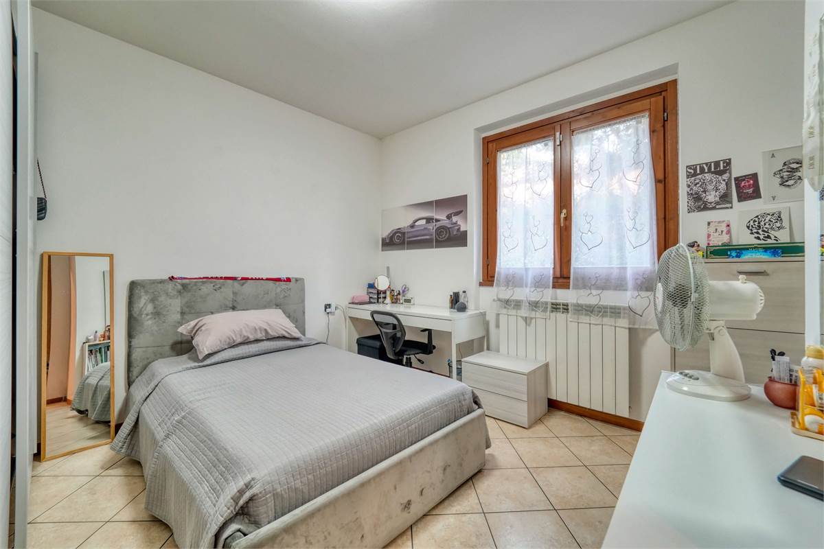 Trilocale al PT con giardino taverna e box