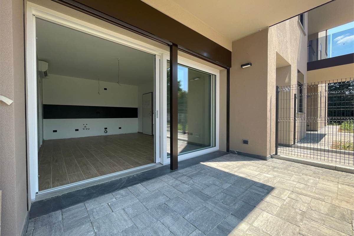 Nuovo bilocale con giardino e box