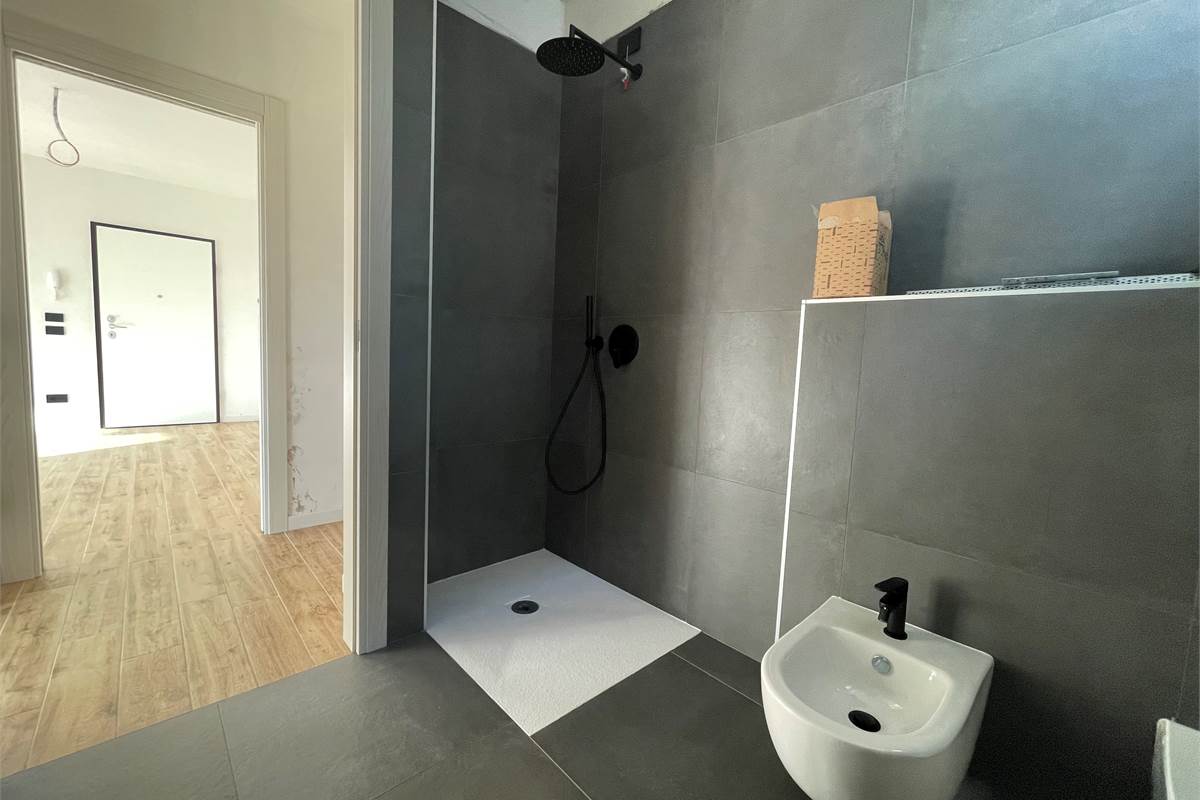 Nuovo bilocale con giardino e box