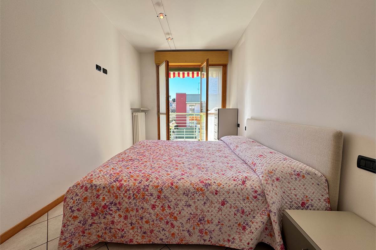 Bilocale con balcone e posto auto