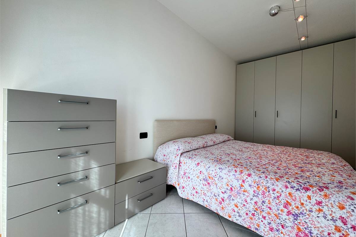 Bilocale con balcone e posto auto