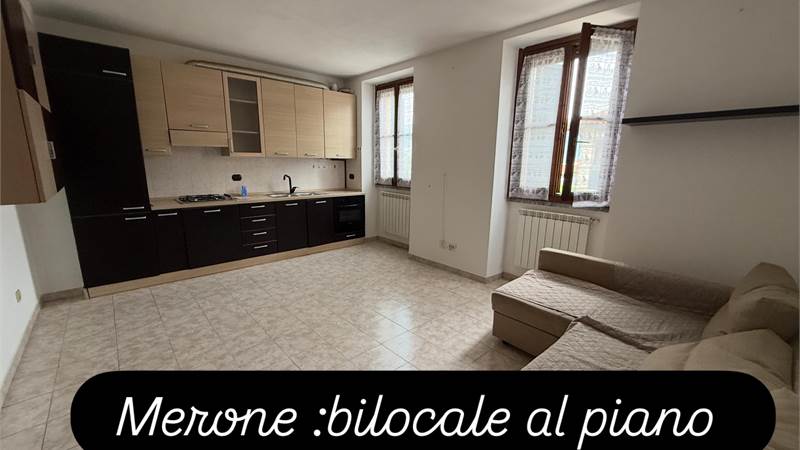 MERONE: IN BEL CONTESTO BILOCALE AMPIO CON POSTO AUTO